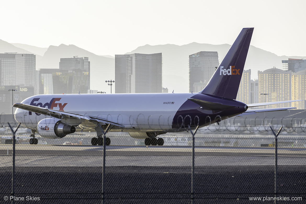 FedEx Boeing 767-300F N143FE at McCarran International Airport (KLAS/LAS) FedEx Boeing 767-300F N143FE at McCarran International Airport (KLAS/LAS)