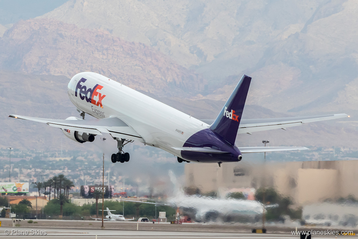 FedEx Boeing 767-300F N145FE at McCarran International Airport (KLAS/LAS) FedEx Boeing 767-300F N145FE at McCarran International Airport (KLAS/LAS)