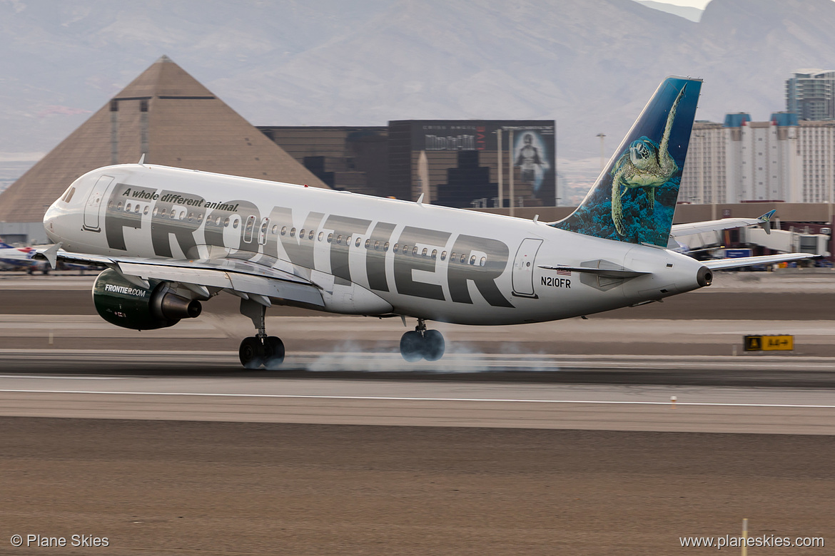 Frontier Airlines Airbus A320-200 N210FR at McCarran International Airport (KLAS/LAS) Frontier Airlines Airbus A320-200 N210FR at McCarran International Airport (KLAS/LAS)