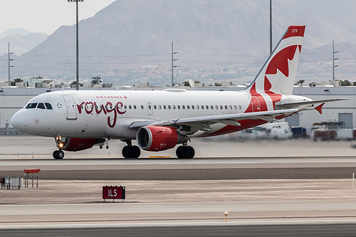 Air Canada Rouge Airbus A319-100 C-GBHZ at McCarran International Airport (KLAS/LAS) Air Canada Rouge Airbus A319-100 C-GBHZ at McCarran International Airport (KLAS/LAS)