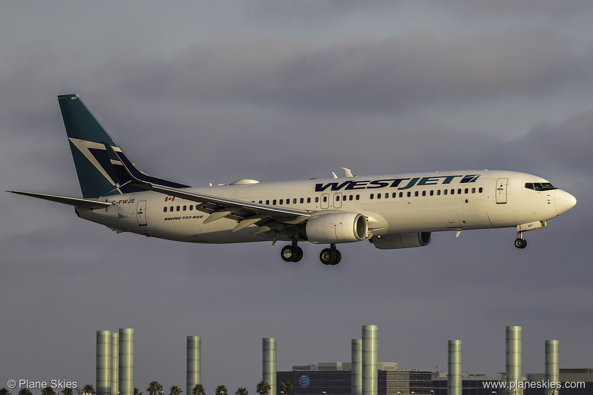 WestJet Boeing 737-800 C-FWJS at Los Angeles International Airport (KLAX/LAX) WestJet Boeing 737-800 C-FWJS at Los Angeles International Airport (KLAX/LAX)