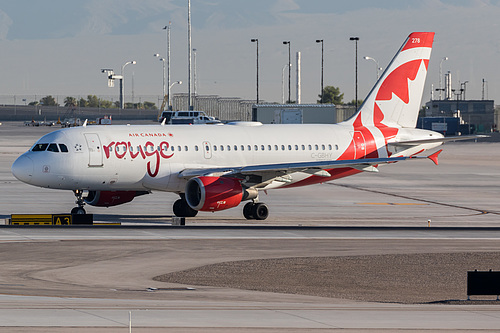 Air Canada Rouge Airbus A319-100 C-GBHY at McCarran International Airport (KLAS/LAS) Air Canada Rouge Airbus A319-100 C-GBHY at McCarran International Airport (KLAS/LAS)