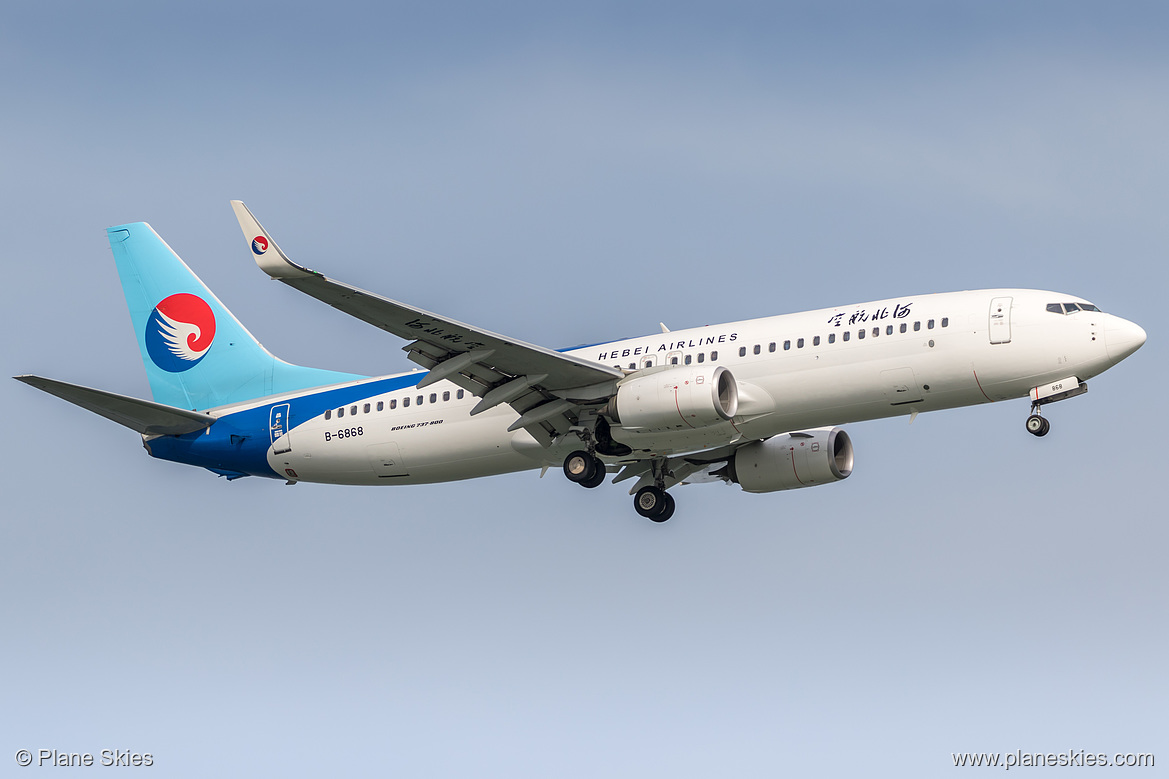Hebei Airlines Boeing 737-800 B-6868 at Singapore Changi Airport (WSSS/SIN) Hebei Airlines Boeing 737-800 B-6868 at Singapore Changi Airport (WSSS/SIN)