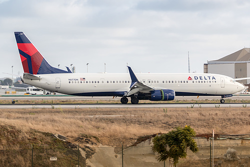Delta Air Lines Boeing 737-900ER N877DN at Los Angeles International Airport (KLAX/LAX) Delta Air Lines Boeing 737-900ER N877DN at Los Angeles International Airport (KLAX/LAX)