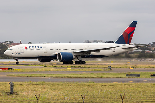 Delta Air Lines Boeing 777-200LR N702DN at Sydney Kingsford Smith International Airport (YSSY/SYD) Delta Air Lines Boeing 777-200LR N702DN at Sydney Kingsford Smith International Airport (YSSY/SYD)
