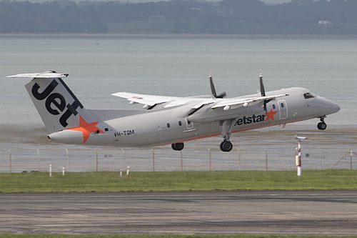 Jetstar Airways DHC Dash-8-300 VH-TQM at Auckland International Airport (NZAA/AKL) Jetstar Airways DHC Dash-8-300 VH-TQM at Auckland International Airport (NZAA/AKL)